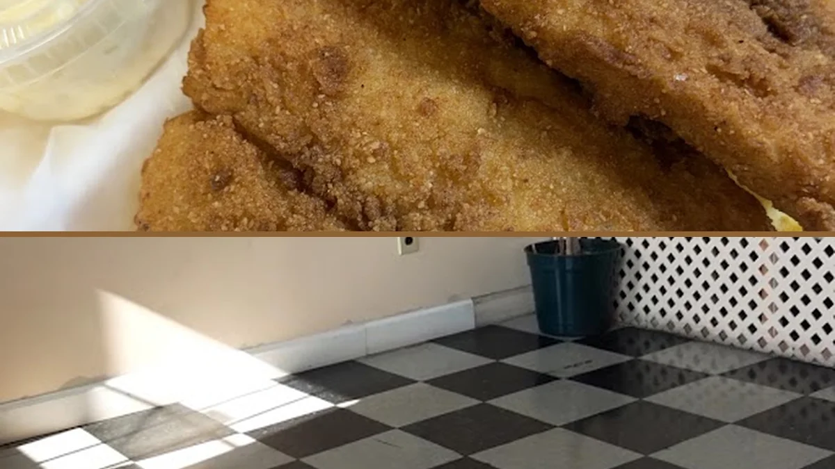 Golden fish and shrimp beside hush puppies.